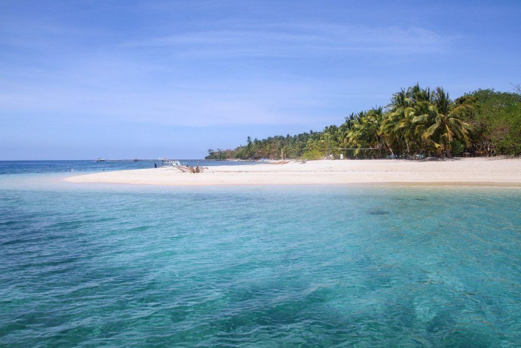 Unspoiled island paradises with pristine beaches and clear waters